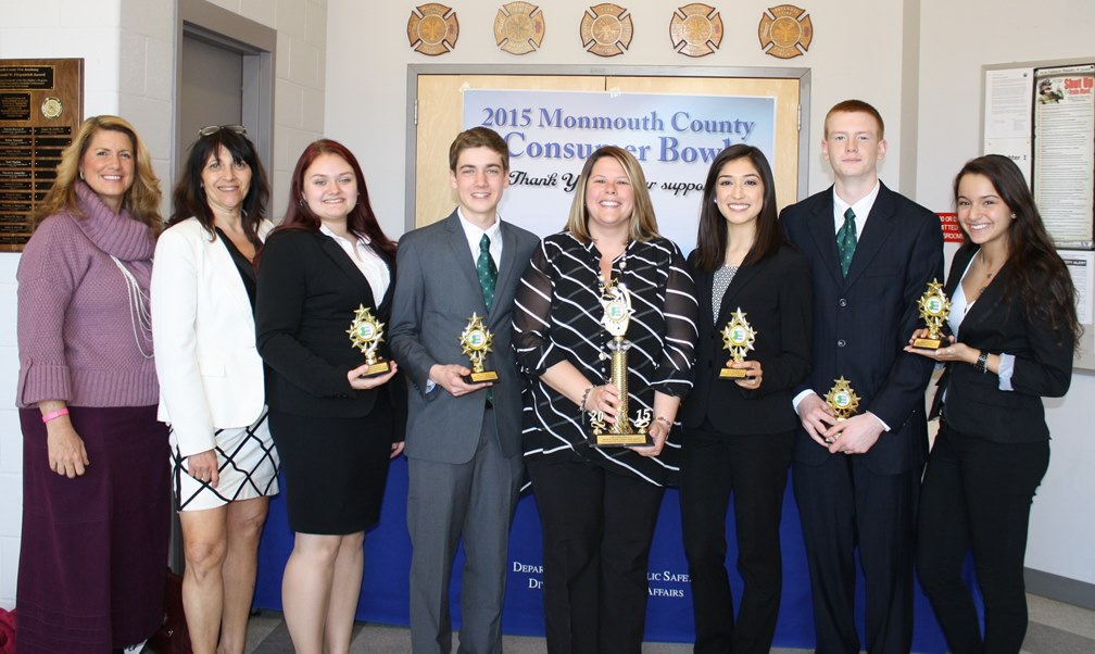 Colts Neck High School wins the 2015 Monmouth County Consumer Bowl on March 30 in Howell, NJ. Pictured left to right: Freeholder Deputy Director Serena DiMaso, Monmouth County Consumer Affairs Director Annmarie Howley, Colts Neck High School team members Logan Jarrett, Donald Friedrich, Advisor Robin Soriano, Michayla Ben-Ezra, Liam McAvley and Emma Pergola. 